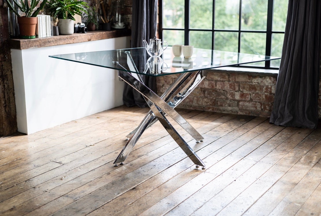 Glass table with chrome legs deals