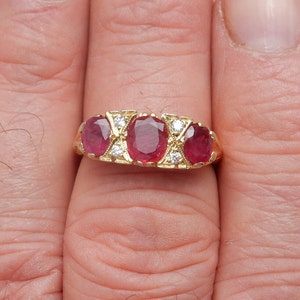 18ct / 18k Ruby & Diamond 7 Stone Carved Half Hoop Ring.