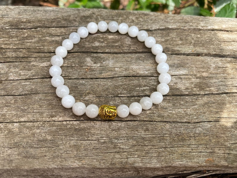 Elastic bracelet in natural Moonstone, Made in France Tête bouddha dorée