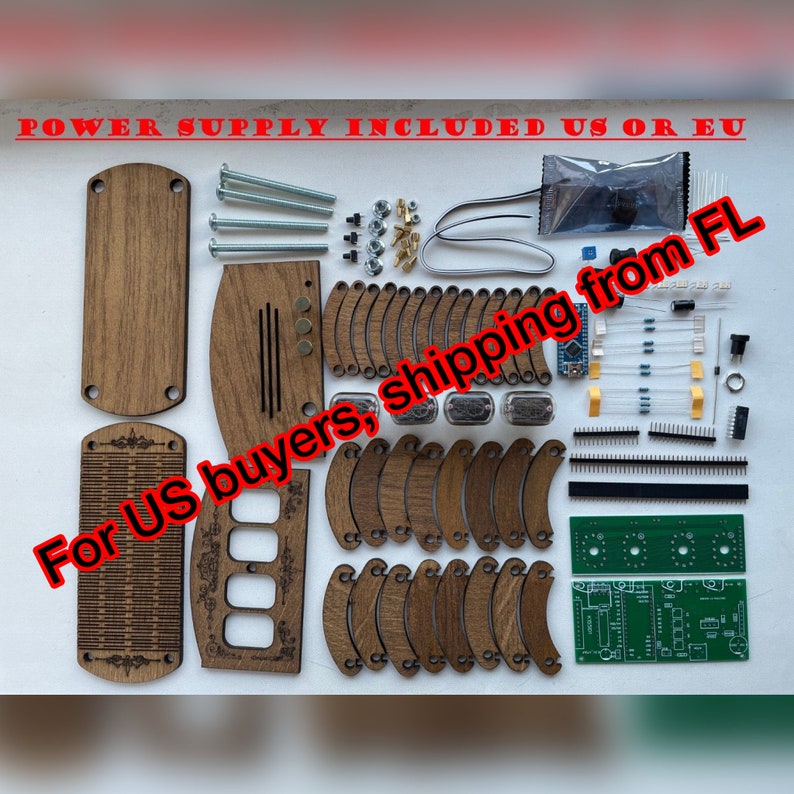 May include: A flat lay of a wooden electronics kit with various components. The kit includes wooden panels, screws, nuts, electronic components, and circuit boards. Text on the image reads "POWER SUPPLY INCLUDED US OR EU".