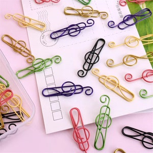 Set of 10 quality music musical treble clef coloured metal paper clips for stationary, cards, pictures, scrapbooking, art projects.