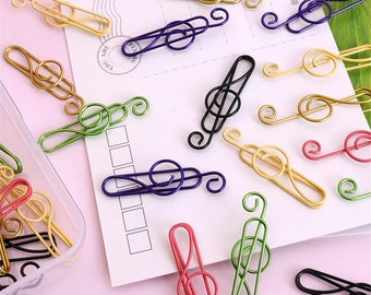 Set of 10 quality music musical treble clef coloured metal paper clips for stationary, cards, pictures, scrapbooking, art projects.