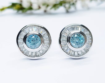 Vintage style baguette halo with aquamarine centre stone