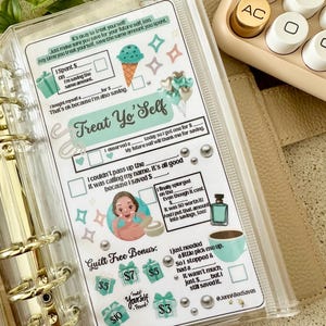 May include: A clear plastic binder insert featuring a "Treat Yo' Self" savings tracker with printed text, checkboxes, and illustrations of an ice cream cone, perfume bottle, coffee cup, gift boxes, and a person applying skincare products.