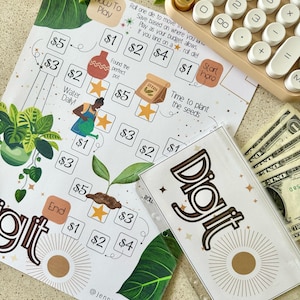 May include: A financial literacy game with a botanical theme. The game board features illustrations of plants, pots, and seeds, with dollar amounts and instructions. A clear plastic "Digit" envelope and a calculator are also visible.