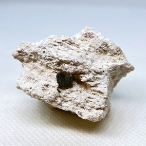Perfect Bixbyite Crystal on Rhyolite matrix from Thomas Range, Juab County, Utah, USA.