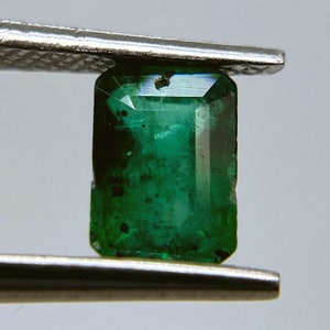 Natural emerald from Muzo, Colombia.
