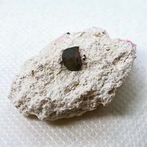 Perfect Bixbyite Crystal on Rhyolite matrix from Thomas Range, Juab County, Utah, USA.