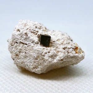 Perfect Bixbyite Crystal on Rhyolite matrix from Thomas Range, Juab County, Utah, USA.