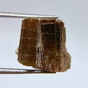 Multicolour tourmaline (brown+yellow+pink crystal) from Malkhan pegmatite field, Chitinskaya Oblast, Eastern Siberia, Russia.