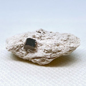 Perfect Bixbyite Crystal on Rhyolite matrix from Thomas Range, Juab County, Utah, USA.