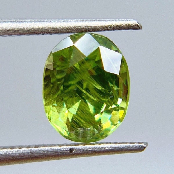 Natural Demantoid with horsetail inclusion form Ural mountain, Russia.