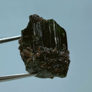 Natural Green tourmaline crystal with Lepidolite crystals from Minas Gerais, Brazil.
