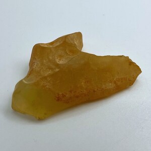 Libyan Desert Glass (Libyan Gold Tektite), 28 million years old from the Sahara Desert.