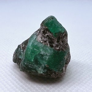 Natural emerald gem rough crystal from Ethiopia.