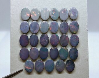 オーストラリア産の鉄石にセットされた天然ダブレットオパール。（1点の価格です！）