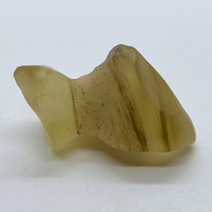 Libyan Desert Glass (Libyan Gold Tektite), 28 million years old from the Sahara Desert.