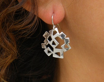 Light earrings made of silver. Geometric design. Earrings with geometric shapes. Light earrings. Dangle earrings