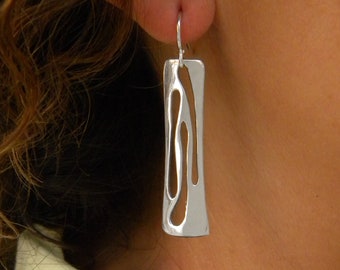 Light earrings made of silver. Earrings with three elongated cuts. Long earrings. Dangle earrings