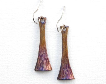 Colourful earrings made of titanium. Long dangling earrings made of oxidised titanium. Silver hooks. Titanium jewellery