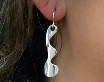 Elegant earrings made with silver. Long earrings. Dangling earrings, drop earrings. Handmade jewel