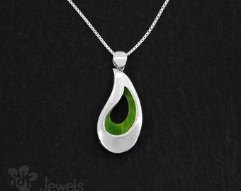 Silver pendant in the shape of a drop with volume and enamel inside. Drop-shaped necklace. Teardrop pendant. Handcrafted jewel