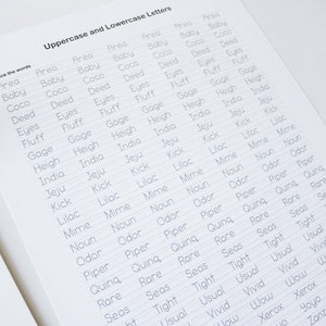 May include: A worksheet with the words "Uppercase and Lowercase Letters" at the top. The worksheet has a list of words in alphabetical order, starting with "Area" and ending with "Zanza". Each word is written twice, once in uppercase and once in lowercase. The words are written on lined paper.