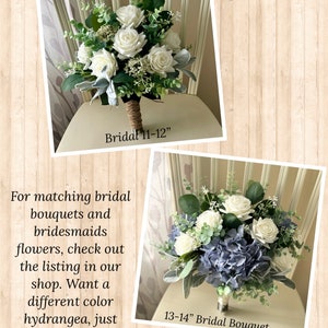 May include: Two floral bouquets featuring white roses, green eucalyptus, and dusty miller foliage. The top bouquet has a jute-wrapped handle and is labeled Bridal 11-12 inches. The bottom bouquet includes blue hydrangeas and is labeled 13-14 inches.