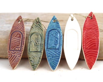 Handmade Ceramic Kayak Ornament: Natural Clay Decoration