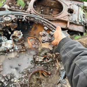 Piece of Russian tank named “moscow” recycled in Ukraine, T-72 or T-90C, series V. A picturesque industrial steampunk decor. Buy now!
