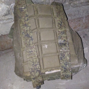 Russian military uniform. The FRONT PART of the bulletproof jacket WITHOUT metal plates recycled in Ukraine. Slightly used & torn. Buy now!