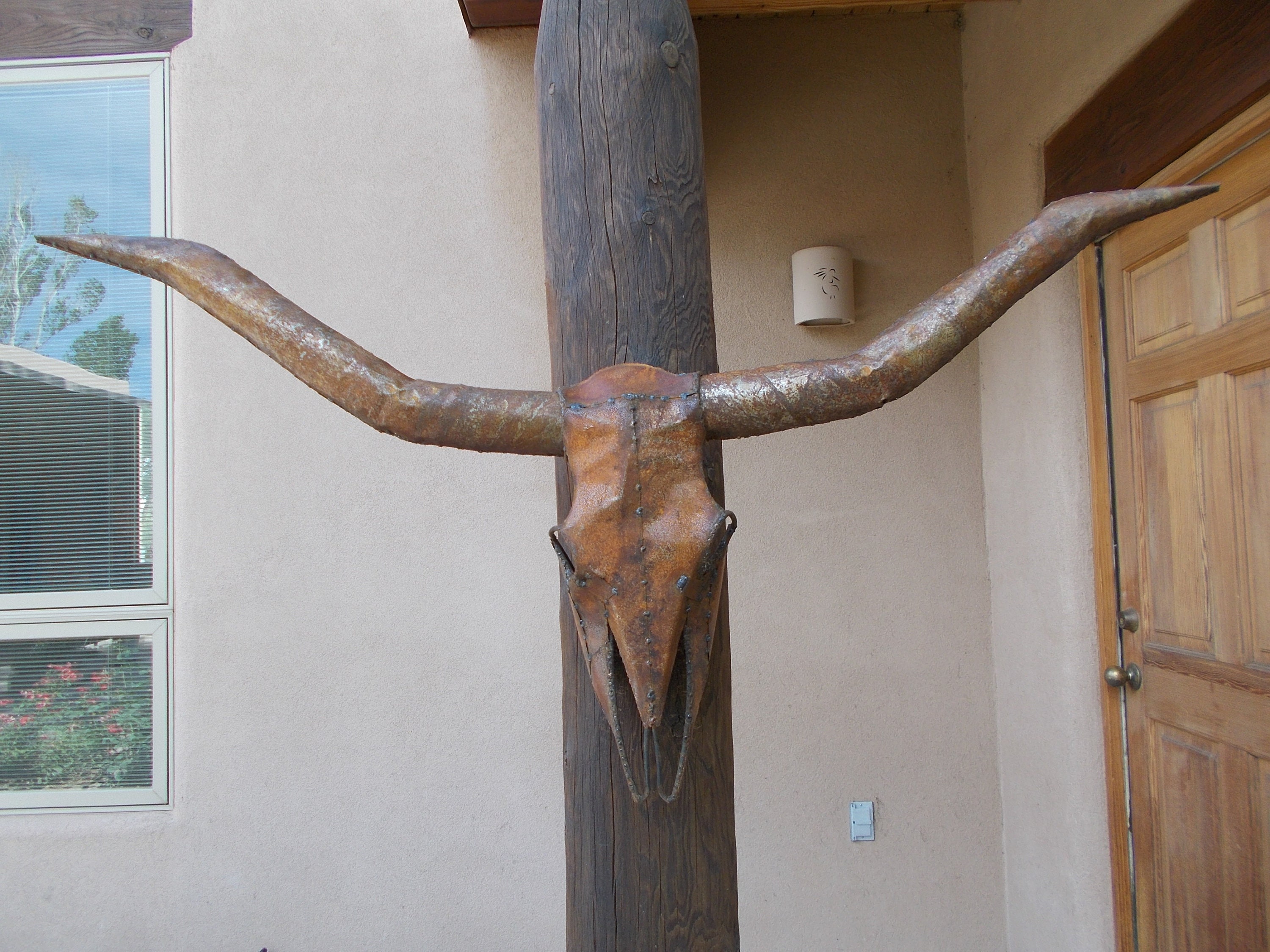 Metal Longhorn steer skull 4 feet 9 inches wide tip to tip of the horns. Western Decor