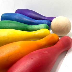 Children’s bowling pins, skittle set. Wooden toy, room decor, tabletop game