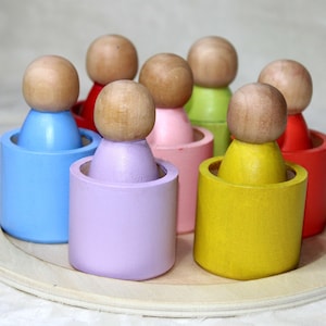 Seven peg people in cups - Friends in cups