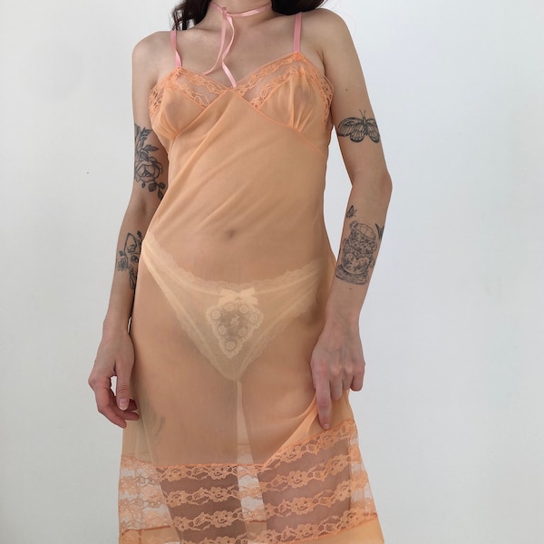 Little vintage peach sheer nightgown with pink straps and lace details