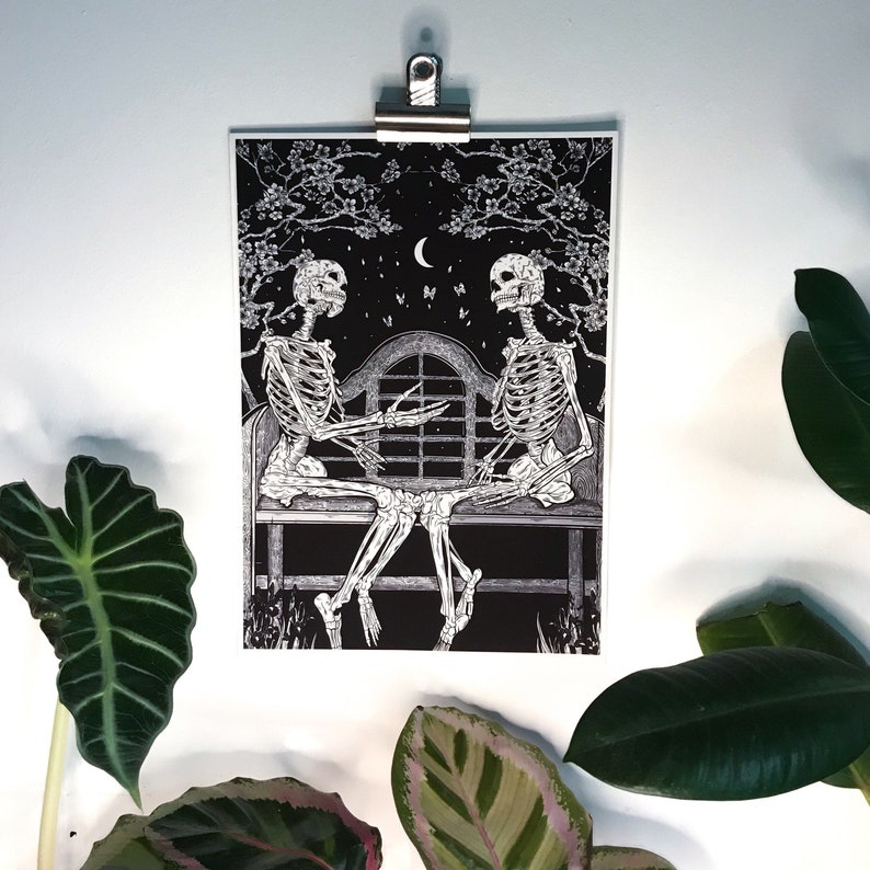 TALK A4 heavyweight art print with skeleton couple and cherry blossom design.