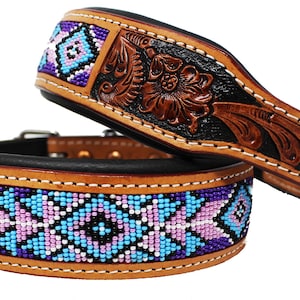 May include: A brown leather dog collar with a black leather backing and a beaded design in shades of purple, pink, blue, and white. The collar has a silver buckle.