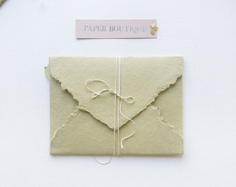 Handmade cotton envelopes with uneven edges. send