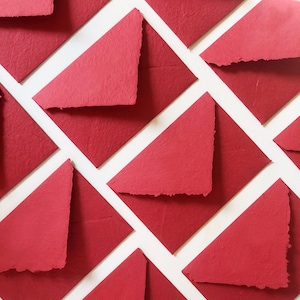 Handmade cotton envelope with uneven edge. Red
