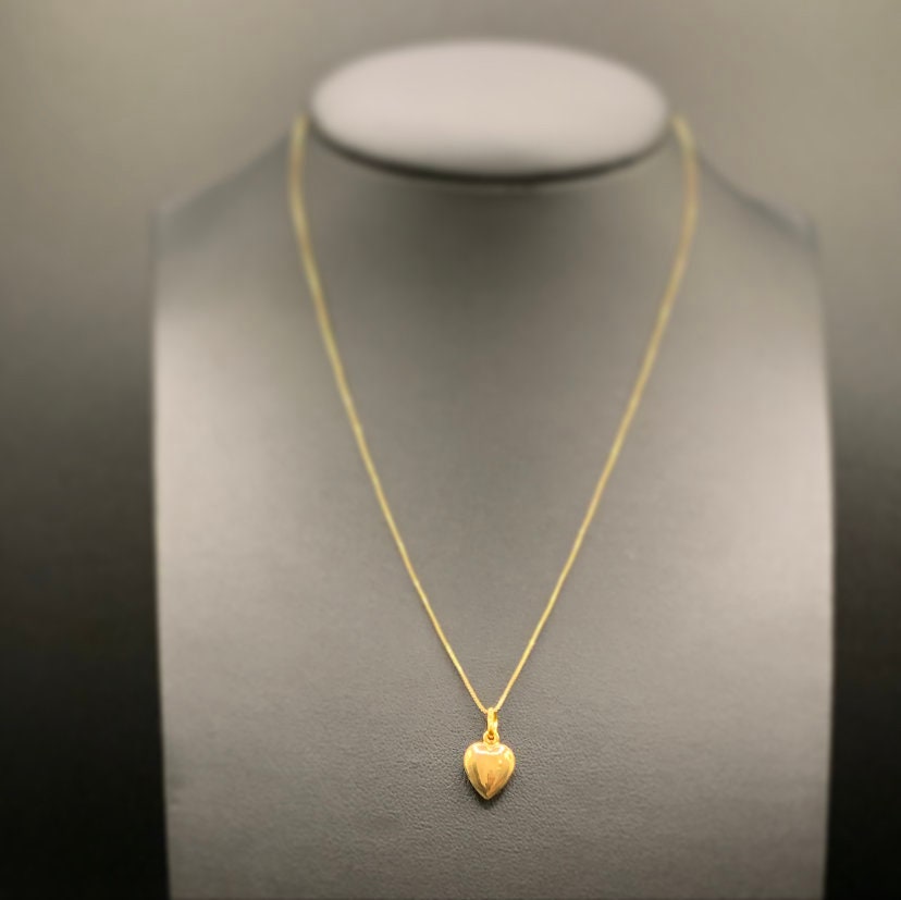 Gold heart pendant design discount