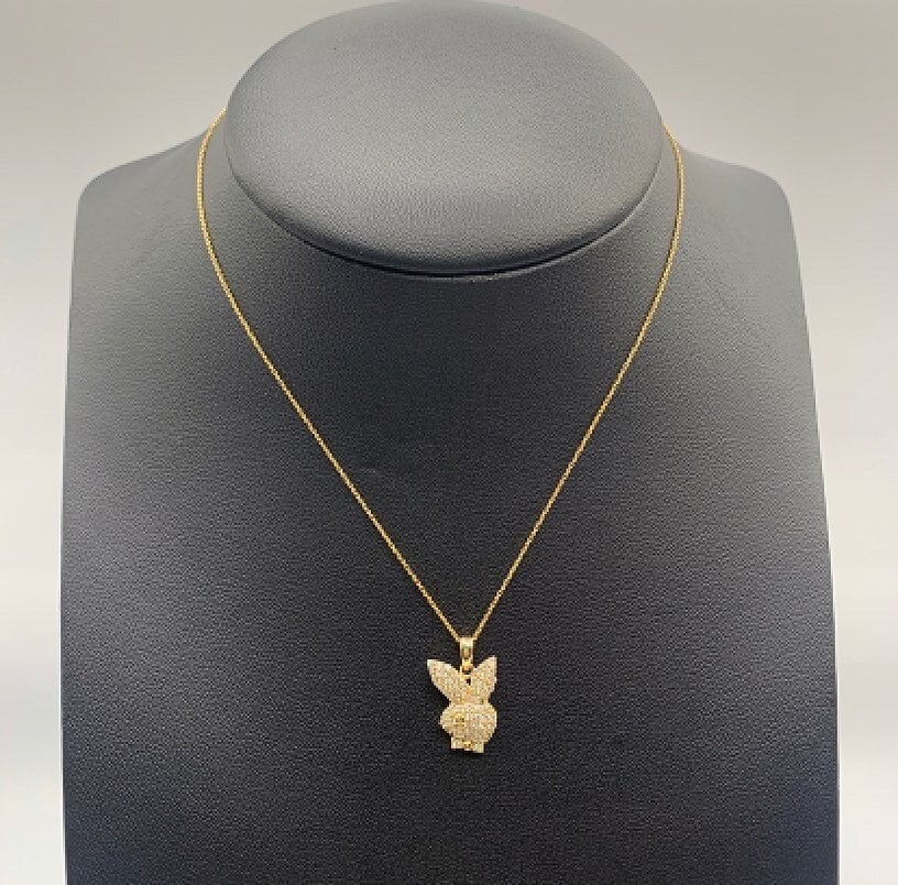 Gold playboy pendant Etsy España