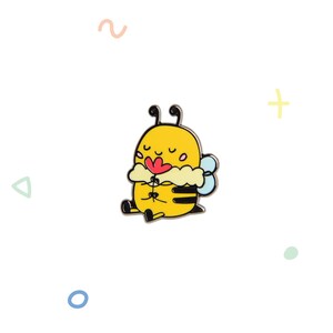 May include: A yellow and black cartoon bee with a fluffy white collar is holding a red flower. The bee has closed eyes and a happy expression.