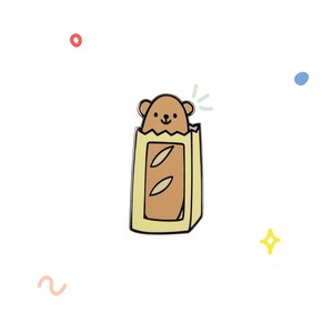 May include: A brown bear wearing a yellow paper bag with a brown baguette inside. The bear is smiling and has a small red nose.