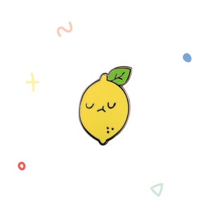 May include: A yellow lemon with a green leaf and a cartoon face. The lemon has a sad expression with closed eyes and a frown.