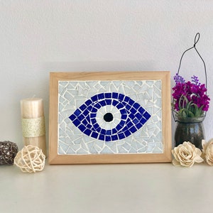 Mosaïque Evil Eye dans un cadre en bois