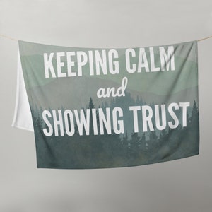 May include: A green and white tapestry with a forest scene and the text "KEEPING CALM and SHOWING TRUST".