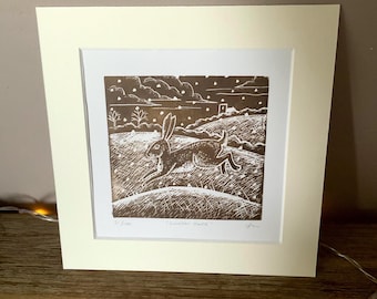 Leaping Hare Lino Print: Original Limited Edition linocut, Winter Hare Art. Wildlife lover gift.