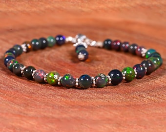 Armband med slät eldkulor i svart opal, armband med eldopal i Welo, armband i 925 sterlingsilver, oktober månadssten, minimalistiskt armband,