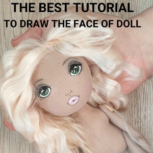 May include: A tutorial on how to draw the face of a doll. The image shows a doll with blonde hair, green eyes, and pink lips. The tutorial includes a 1-hour video, PDF files, and photos. The text "ENGLISH ESPAÑOL" is also visible in the image.