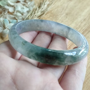Type A Icy Translucent Jadeite Bangle - 53.7mm Off White with Black and Green Petals Oval Bangle